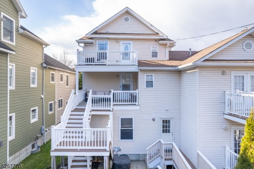 Unparalleled location! This updated 3 bedroom condo is just steps to both the train and Morristown's vibrant downtown. One enters this bright and spacious two-story condo through your own private entrance into the mudroom. The main level offers a kitchen with stainless appliances and granite countertops that opens to the living and dining space. The level is complete with a powder room, stackable washer/dryer and doorway to a stairwell that leads to the front of the building. Upstairs are three bedrooms and a full bath. The generous primary suite offers a bonus space with custom tray ceiling that could be used as a home office, nursery, or sitting room. There is hardwood flooring throughout and incredible natural light. Outside offers a spacious deck off the main level, a private balcony for the rear-facing bedroom and space for a grill. There is off-street parking for two cars in the back of the building as well as permitted on-street guest parking. There is a large basement storage space as well. Don't miss your chance to make this your home in the heart of Morristown.