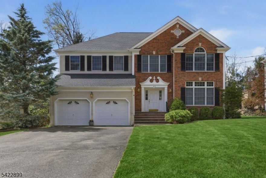 Welcome to this beautifully maintained Madison colonial, ideally located on a quiet street just steps from vibrant downtown Madison, train stations, and highly sought-after schools. This spacious 4-bedroom, 2 full and 2 half bath home offers the perfect blend of comfort and functionality. A grand open foyer welcomes you in and sets the tone for the home's spacious layout. Enjoy separate living and dining areas, perfect for both everyday living and entertaining. The large eat-in kitchen flows seamlessly into the attached family room, creating a warm and inviting central gathering space. Enjoy peace of mind with a newer roof and well-maintained systems throughout. The large unfinished basement features high ceilings, a half bath, and is fully climate-controlled with both heat and air conditioning. With abundant electrical outlets throughout, the space offers endless potential perfect for creating a home gym, recreation room, office, or additional living area tailored to your needs outside, a large deck provides the perfect space for outdoor dining, relaxing, or hosting gatherings. A 2-car garage adds convenience and additional storage.A wonderful opportunity to own a home in one of Madison's most desirable locations