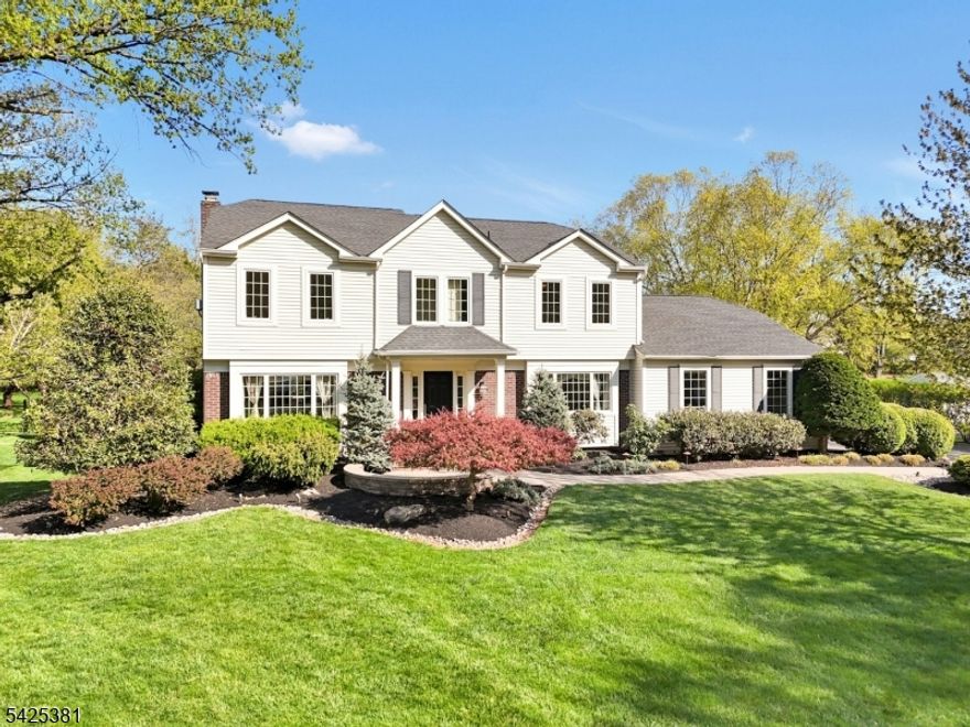 Beautifully updated home on a quiet cul-de-sac, offering a resort-style private yard that backs to open space for unmatched serenity and views. A stunning in-ground pool, expansive composite deck with electric awning, and a paver patio create the perfect setting for effortless entertaining and everyday relaxation. Inside, the home impresses with hardwood floors, premium lighting, custom blinds/shades, and newer Andersen windows throughout. The formal dining room flows seamlessly into the spacious family room, where an inviting gas fireplace anchors the space. The sun-filled kitchen features granite countertops, stainless steel appliances, a breakfast bar, and a generous dining area overlooking the lush backyard oasis. A flexible first floor office/bedroom and laundry room provide ideal convenience for today's lifestyle. Upstairs, you'll find four spacious bedrooms with neutral carpeting and ceiling lights/fans. The primary suite offers three closets (including a walk-in) and a private ensuite bath. The large, finished basement adds exceptional bonus space, perfect for recreation, fitness, media, or play. Major updates and amenities include a 2019 roof with solar panels, 2017 furnace and air conditioning, Level 2 EV charger, generator connection, exterior lighting and shed. This exceptional property delivers privacy, beauty, and thoughtful upgrades from top to bottom, truly move-in ready and designed to enjoy.