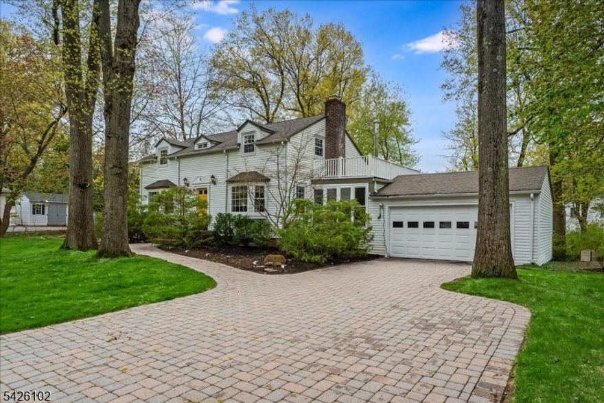Flooded with natural light, the heart of this midcentury Colonial is an expansive, open-concept living space w/separate formal LR. The main level also features a versatile 1st fl bed & bath & a sunroom w/direct access to the backyard & 2 car garage w/EV charger. This could be your artist studio, office, mudroom or even greenhouse. Upstairs are 2 addl generous beds, incl a primary ensuite w/walk-in closet & bath. The landing area is currently used as a den, but could be a reading nook or office. The finished basement adds lots more living & storage space, w/ a huge rec rm, office, powder rm & laundry rm.  Situated on an oversized lot, the property feels like a private sanctuary. There is space galore for vegetable gardening, playtime, hardscape designs, a firepit area & more.The neighborhood is extremely picturesque & tranquil, with tree-lined streets & a rustic vibe, while just minutes from extensive amenities. Enjoy the outdoors at S. Mountain & Eagle Rock Reservations (don't miss the best NYC view avail anywhere); Turtle Back Zoo, Codey ice skating arena, & the Waterfront. Montclair, Maplewood & S. Orange villages nearby add to a fabulous restaurant & shopping scene. Several convenient commuter options are available, incl a town jitney to Midtown Direct train stations. Modern finishes, functional design, & outdoor beauty make this property a rare find. If you haven't found the space you want in other towns, this property might be the value you have been seeking.