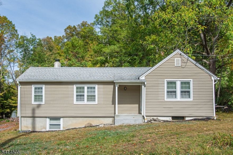 Welcome to this Charming, Immaculate 2-Bedroom Ranch!Set on a picturesque, expansive lot, this beautifully maintained home offers a newer kitchen with gas stove and wall oven, along with a bright and spacious living room. The large formal dining room showcases stunning hardwood floors throughout. A stylishly updated bathroom (2023) and two oversized sheds with electric add comfort and convenience.The walkout basement with plenty of storage, and updated systems including a Roth oil tank and 2012 furnace. With its serene, park-like setting this property truly combines charm, comfort, and value. New Septic 2023