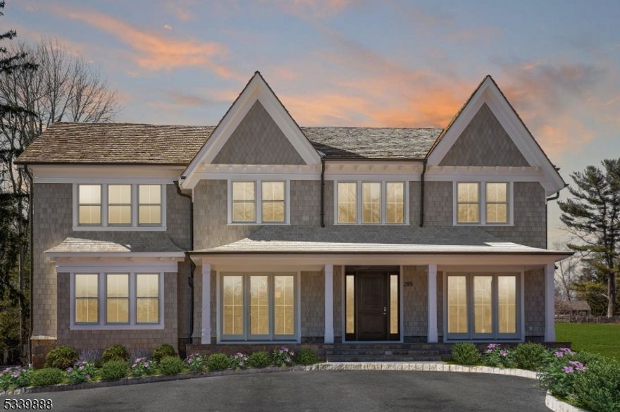 ARCHITECTURALLY DISTINCTIVE & ELEGANTLY SITUATED in the coveted Beechcroft Neighborhood, this exceptional 7-bedroom, 7 full-bath, and 2 half-bath estate offers unparalleled luxury. A grand two-story foyer with a custom staircase, soaring ceilings, and exquisite finishes greet you. The oversized family room with a gas fireplace is ideal for entertaining, while the private first-floor guest suite provides comfort and privacy. The gourmet kitchen is a chef's dream, featuring high-end Wolf and SubZero appliances, a natural quartzite island, farmhouse sink, and a butler's pantry with wine chiller. The master wing is a tranquil retreat with a gas fireplace, sitting room with wet bar, and a spa-like master bath with heated floors, soaking tub, and an oversized shower. Experience ultimate luxury w/ dual walk-in closets that rival the finest in style and space. The fully finished basement boasts a gym, large recreation room, & pre-wired home viewing room. Discover this masterful collaboration executed by esteemed builder Singer Properties, designed by acclaimed architect Thomas Baio, AIA, and interior designed by Debra Dennis Designs. Additional highlights include first and second-floor laundry rooms w/ heated floors, a 4-car garage w/mudroom. Exterior features include: Cedar roof, bluestone patios, & covered front entry. Whole-house generator, pre-wired for EV charging. Located in one of Short Hills' most prestigious neighborhoods, this home blends luxury and comfort in every detail.