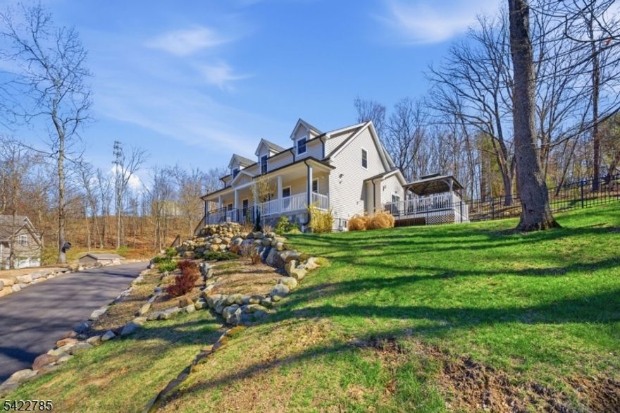 Welcome to 5 Laura Lane, a five year young center hall Colonial in Oakland NJ, one of Bergen County's most desirable towns. A lemonade porch leads to a two story foyer with hardwood floors. The main level offers a formal living and dining rooms, and a living room with fireplace that opens to a modern kitchen with quartz counters, custom cabinetry, and stainless steel appliances. Upstairs features three bedrooms including a primary suite with two walk in closets and a private bath, plus laundry. Finished basement with full bath and flexible space. Close to Oakland schools, Ramapo Mountain State Forest, Crystal Lake, downtown Oakland shopping, and NYC commuting routes, this home offers the lifestyle today's buyers are searching for.