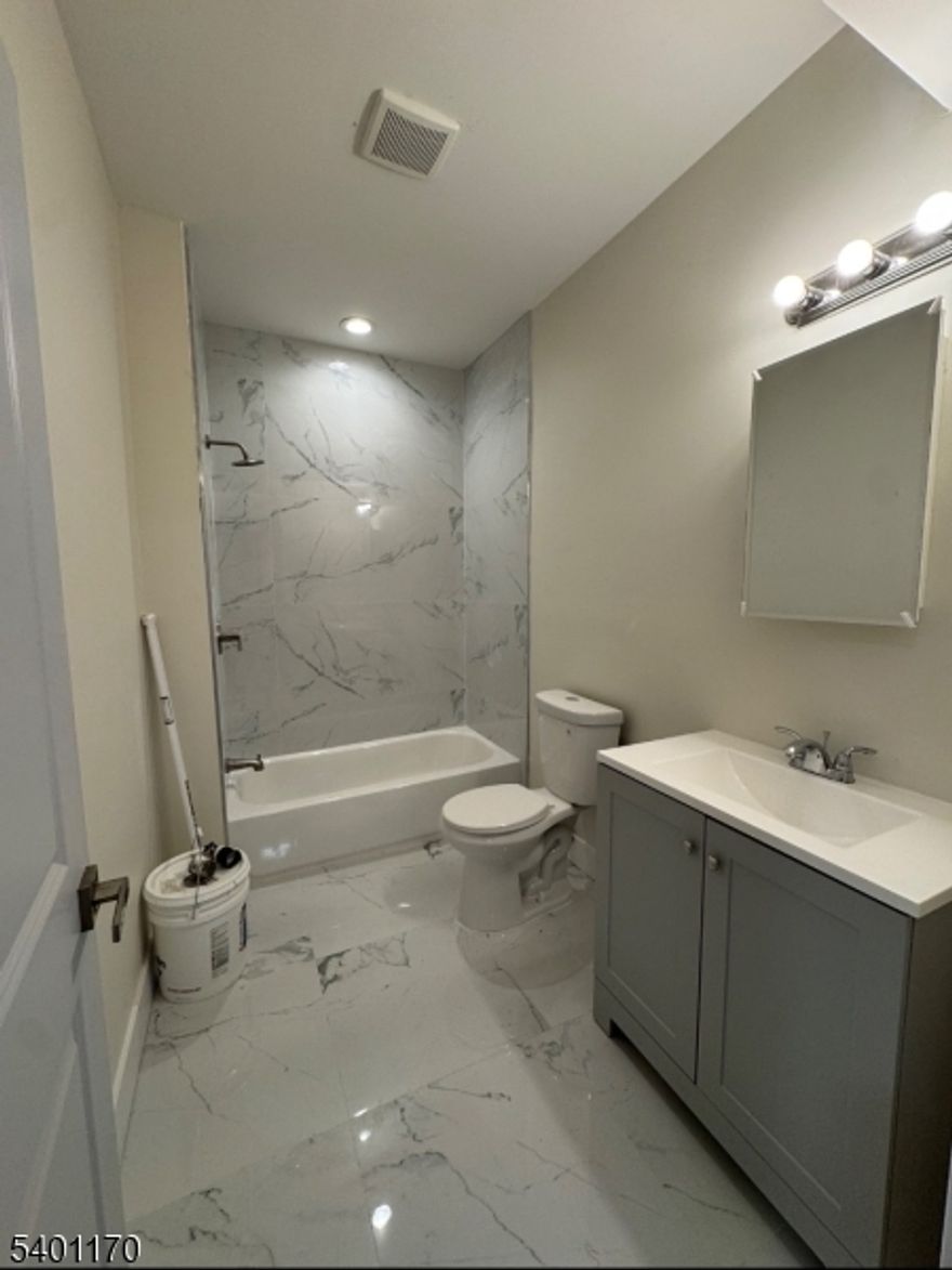 This spacious, newly renovated first-floor apartment offers comfortable living with 6 bedrooms and 3 full bathrooms. The home features a fresh, modern interior and is move-in ready. The kitchen and living areas provide generous space, and the layout is ideal for a variety of living arrangements.Additional conveniences include washer and dryer hookups, allowing for easy in-unit laundry setup. Don?t miss the opportunity to enjoy a refreshed home with plenty of room and great functionality.