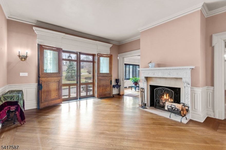 A rare, irreplaceable canvas in a prime location with architectural bones you cannot recreate today. Welcome to 90 Gregory Ave a grand 1873 estate set on a prominent corner lot in one of West Orange's most coveted and picturesque enclaves. With over 5 bedrooms, 5 bathrooms this one-of-a-kind residence presents a remarkable opportunity to restore, reimagine, and create a legacy home tailored to your vision. Home features include: Original hardwood floors, intricate moldings, stunning pocket doors that speak to an era of timeless design with 7+ fireplaces throughout. A grand foyer welcomes you with double entry doors, a statement fireplace, and sweeping staircases that set the tone for the home's scale and sophistication. Formal dining room complete with a butler's pantry, wet bar & dramatic floor-to-ceiling windows. Chefs kitchen is appointed with Sub-Zero refrigerator and Viking appliances, offering a strong foundation for a modern culinary experience. Solarium, adorned with hand-painted ceiling & lattice panels with glass-lined walls. Outdoors, the estate unfolds with a circular paver block driveway centered around a statement fountain. The backyard offers a tranquil koi pond & expansive deck space ideal for entertaining or quiet relaxation. Bring your vision. Restore its grandeur. Make it unforgettable. Just approximately 16 miles away from the energy of NYC offering a seamless blend of suburban privacy and metropolitan accessibility.