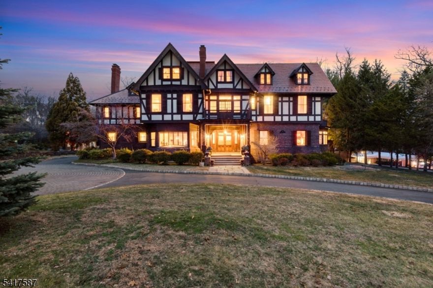 A rare, irreplaceable canvas in a prime location with architectural bones you cannot recreate today. Welcome to 90 Gregory Ave a grand 1873 estate set on a prominent corner lot in one of West Orange's most coveted and picturesque enclaves. With over 5 bedrooms, 5 bathrooms this one-of-a-kind residence presents a remarkable opportunity to restore, reimagine, and create a legacy home tailored to your vision. Home features include: Original hardwood floors, intricate moldings, stunning pocket doors that speak to an era of timeless design with 7+ fireplaces throughout. A grand foyer welcomes you with double entry doors, a statement fireplace, and sweeping staircases that set the tone for the home's scale and sophistication. Formal dining room complete with a butler's pantry, wet bar & dramatic floor-to-ceiling windows. Chefs kitchen is appointed with Sub-Zero refrigerator and Viking appliances, offering a strong foundation for a modern culinary experience. Solarium, adorned with hand-painted ceiling & lattice panels with glass-lined walls. Outdoors, the estate unfolds with a circular paver block driveway centered around a statement fountain. The backyard offers a tranquil koi pond & expansive deck space ideal for entertaining or quiet relaxation. Bring your vision. Restore its grandeur. Make it unforgettable. Just approximately 16 miles away from the energy of NYC offering a seamless blend of suburban privacy and metropolitan accessibility.