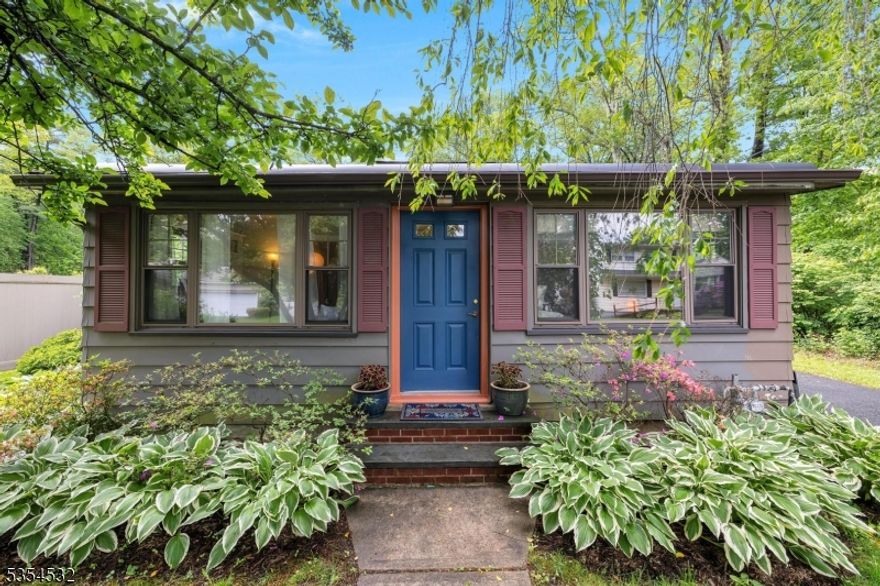 Tremendous alternative to renting or condo! All your own, light and bright, updated with outdoor living space! One floor living with hardwood and laminate flooring, living room/dining room area with dormer for extra natural light, kitchen with maple cabinets and granite countertops, washer and dryer hidden and conveniently located in kitchen cabinet, full bath with tub shower, heart-of-the-house family room with 2 walls of windows, overlooking backyard leads to deck, perfect for entertaining! Other features include pull down steps to attic storage, 2 zone heating, generator hookup, natural gas, public sewer, thermal windows, roof 10 years old, garage/shed as-is (needs roof). Fantastic location - seconds to lake at end of block, less than 5 minutes to Rt. 80, shopping, dining and more.  Fantastic Mt. Olive school system!