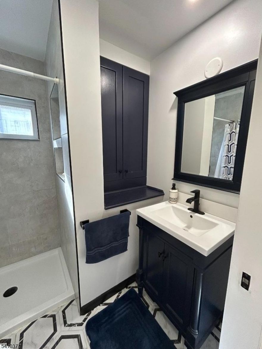 Spacious well-maintained home on a desirable block with potential for future flexibility, the layout and zoning present the possibility to convert to a multi-family with the right permits. This home features 4 bedrooms and 3 bathrooms and ample parking that includes space for multiple vehicles, a boat, or extra storage.