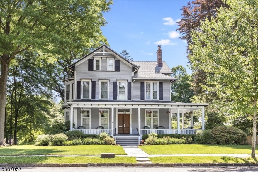 You've been waiting for this one! Blending Victorian details&charm w/modern comforts, this exceptional home retains many original architectural features while offering thoughtful updates throughout. From the moment you enter, you'll be captivated by the grand foyer w/inlaid wood flooring, original molding & two stunning wood-burning fireplaces w/their original mantels perfect for cozy evenings in both the living and dining rooms. Sunlight pours in through picturesque bay windows, highlighting the home's rich character&craftsmanship. The kitchen has been renovated&footprint expanded, featuring white cabinetry&access to the back porch overlooking the gorgeous yard&pool. All of the home's bathrooms have been renovated. With six spacious bedrooms plus a bonus room ideal for a home office, there's plenty of room to live, work&grow. Situated on a fully fenced corner lot, the home is surrounded by professionally landscaped gardens, creating a private backyard oasis complete with a heated in-ground pool, wrap-around front porch&multiple outdoor living spaces perfect for entertaining or relaxing year-round. Additional highlights include CAC, abundant storage and seasonal NYC skyline views. Unmatched convenience w/jitney stop right at your front door. Whether you're sipping morning coffee on the porch, hosting summer pool parties, or watching the garden come to life through the seasons, this home is designed for making lasting memories. A true gem on one of GR's most iconic streets.