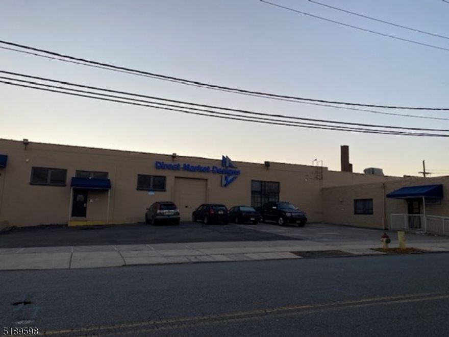TOP GRADE INDUSTRIAL BUILDING AVAILABLE IMMEDIATLEY. APRX 19,812 SQ FT BUILDING W/ 1,000 SQ FT OFFICE SPACE. BUILDING SITS ON APRX 25,552 SQ FT LAND WITH SOME PARKING AVAILABLE. 12-15 CEILING HEIGHT. 2 LOADING DOCKS. 1 DRIVE IN.  800 AMP POWER. MUNICIPAL WATER AND SEWER. GAS & ELECTRIC. ZONED INDUSTRIAL. SEE ATTACHED MEDIA FOR PLANS.