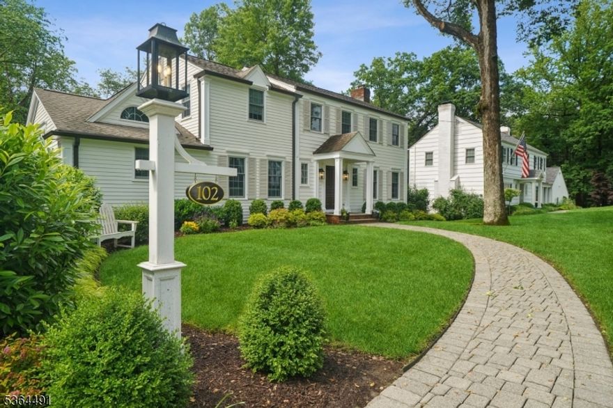 Welcome Home to this stunning 4-bedroom, 2.5-bath center hall colonial nestled in the sought-after Highlands Section of Chatham Township. The heart of the home is a beautifully renovated eat-in kitchen featuring a Sub-Zero refrigerator, 48" Wolf dual fuel range, Marvel wine refrigerator, and Quartzite countertops. Just off the kitchen, the spacious family room impresses with vaulted ceilings, exquisite custom built-ins and moldings perfect for display and storage. Newer 5" wide plank hardwood flooring extends across the first floor. professionally decorated interiors elevate each space with designer light fixtures and textured wallpapers. Upstairs, unwind in the serene primary ensuite, accompanied by three additional bedrooms and a beautifully updated hall bath featuring double sinks. Step outside to a screened-in sun porch--ideal for sunset views, and a fully fenced, level yard spanning over half an acre, complete with professional landscaping, lighting and irrigation. The home's curb appeal is enhanced by a full exterior paint refresh and new custom trim in 2025. This home offers timeless design and many more thoughtful upgrades throughout including a newer HVAC system, water softener and new washer/dryer. The Highlands neighborhood Association is a great way to integrate into the community and offers many activities. Convenient to top rated Chatham schools and mid-town direct train.
