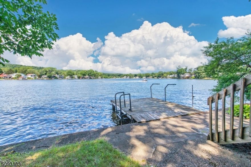 Lakefront Apartment with stunning, year-round views. Open floor plan, spacious living space on one floor. Bedroom overlooks lake as well. Enjoy lake lifestyle with your own deck & dock. Great location! Extras include a half bath -nice for entertaining. Laundry room & storage area and/or a 2nd smaller bedroom. Additional storage in basement. The location can't be beat. Landlords painting deck and treating dock. Indian Lake offers lots of joy with swimming, boating (motor boats allowed), fishing, ice-skating in the winter or just plain ol' relaxation -taking in the scenery & great community energy.* Walking distance to Denville, which is the Hub of Morris County with NYC direct train & buses. Near Rt. 80, 287, 46 and 10.  A very walkable DWTN with plenty of shopping, restaurants  - all that is needed to make life simple & convenient. (*ILCC membership required to use beaches & boats). Landlord prefers no dogs, okay with cats.