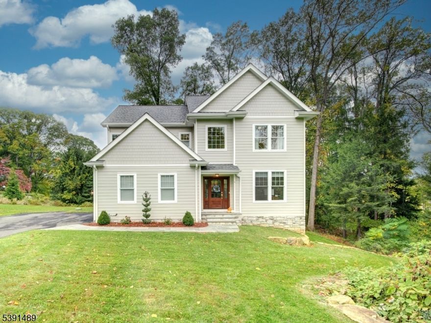 2023 custom-built home for current owners with discerning eye to attention and detail on a cul de sac in an idyllic suburban community of Denville. Every finish was hand-selected to create a space that feels both sophisticated and deeply livable. 9ft ceilings throughout. At the heart of the home, the chef's kitchen blends beauty and function with custom cabinetry, another spacious pantry with even more custom cabinetry, GE Monogram 36" six burner range & oversize cafe refrigerator. A breakfast area with large windows overlooks expansive yard opening to the outdoors and bathing the space in natural light. The first floor flows gracefully across gorgeous hardwd floors to the inviting living room with a gas fireplace & dining room. Guest Bedrm on main living area with bathroom suite . Bonus private office or another guest bedrm. Upstairs, the primary suite is a serene retreat, dual walk-in closets, and a spa bath featuring designer Riad Tile Zellige Tile,2 vanities.3 additional bedrooms, 2 baths and a conveniently located laundry room complete the 2nd floor. The lower level offers add flexibility. Here you will find a 12 ft ceilings,walk out, plumbing and ready for this large area to be finished for hobbies,or recreation. 2 car garage, a spacious level back yard. Denville offers sophisticated  lifestyle ,strong schools, w/ sunset lake views, hiking trails, farmer's markets, and local events like Denville Street Fairs. 35 miles for NYC commute options. Mins from Rt 46 and Rt 10.