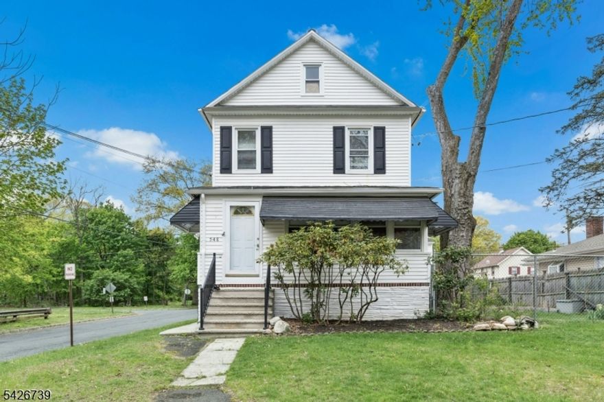 Classic Colonial with incredible potential and low taxes in a quiet, highly desirable neighborhood! This 4-bedroom, 2-bath home offers a flexible layout and generous space, ready for your personal touch. The first floor features a welcoming foyer, sun-filled den with abundant windows, spacious living room, and a large open kitchen adjacent to the dining room perfect for everyday living and entertaining. A first-floor bedroom and beautifully updated full bath add convenience and versatility. Upstairs, the second level offers a cozy sitting room, two oversized bedrooms, and a stunning renovated full bath. The third floor boasts a huge fourth bedroom ideal for a private retreat, home office, or guest space. A standout feature is the oversized 2-car garage with loft space, complete with a bonus office, kitchenette, and game room endless possibilities for work, play, or studio use. Walkout basement offers ample storage and the expansive yard provides plenty of outdoor space to enjoy. Recent updates include new bathrooms and a new split-system AC. Located just blocks from schools, shopping, and NYC transportation, with easy access to major highways, this home is a commuter's dream. With a little TLC, this property offers incredible investment potential and the opportunity to create something truly special!