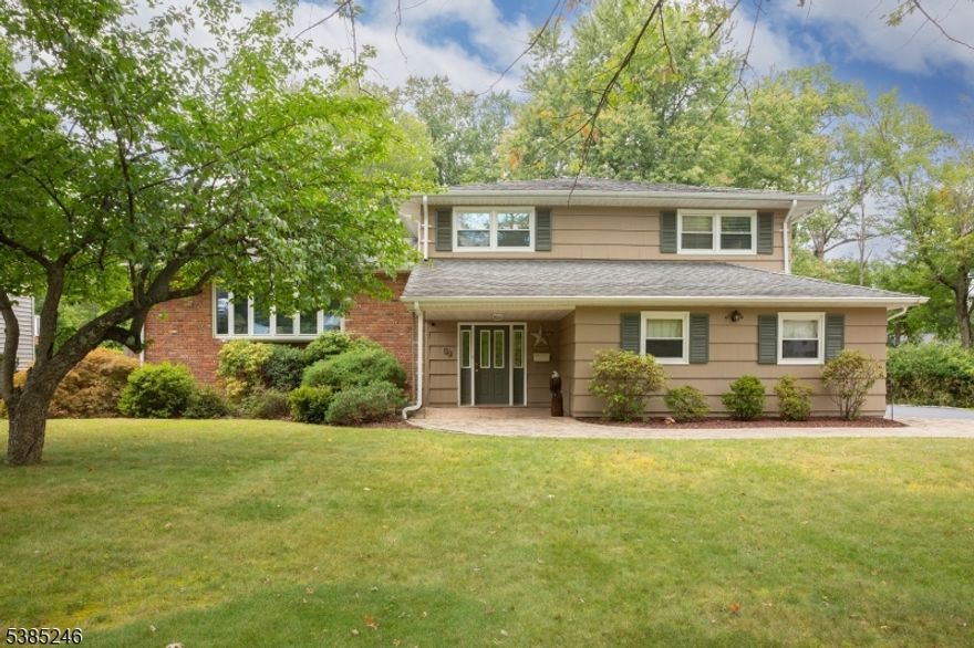 Expanded Split with the care of love! great residential street! Large foyer leads back to a family room or possible 4th bedroom, currently used as office and rec room. Upstairs is large living room with hardwood floors, bow window, open into dining room area. Eat in kitchen with center island and breakfast bar! Granite counters, and Stainless appliances enhance this space. All open to a magnificent great room surrounded with all casement windows and sliding glass doors to deck, skylights plus vaulted ceiling looking out to nature. The gas fireplace is the added pleasure! Now ascend to the third level which has a primary bedroom with 3 closets and private bath. 2 more bedrooms complete this area. On the lower level you have a finished basement, with an exercise room, office or many possibilities. 2 Car garage is on main level , and laundry also. Newer paved driveway, upgraded 200 amp service, gas furnace and central air. Close to community pool and great schools. To show this home is to sell it!! Chimney, liners, flue in as-is conditions; no known issues. HIGHEST AND BEST OFFER PACKAGES DUE, FRIDAY, SEPTEMBER 26TH AT 12:00PM