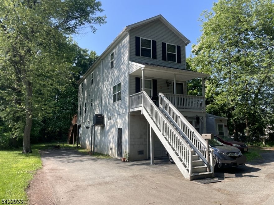 11 year old, 2,200 sq ft single-family home featuring 3 spacious bedrooms and 3 full bathrooms. Built in 2014 on an elevated foundation, the home offers impressive 10-foot ceilings on the ground floor. .Set on a 0.3-acre lot with scenic river and park views, this home provides both comfort and serenity. Interior finishes include a mix of hardwood, tile, carpet, and vinyl flooring, along with a partially finished ground floor offering versatile space. The kitchen is equipped with modern appliances including a refrigerator, range/oven, microwave, dishwasher, and garbage disposal. Enjoy year-round comfort with forced air and electric heating, complemented by central air conditioning. The home's exterior features low-maintenance vinyl siding and a durable asphalt roof. Ideally located near major highways, shopping malls, and less than 30 minutes from New York City, this property offers the perfect balance of convenience and tranquility. The current owner pays approximately $2,200 annually for flood insurance. Home built to exceed current flood guidelines. Storage shed as-is.  Seller will not issue a credit, repair, or remove shed. FHA loans may not qualify as this property is zoned as non-conforming in a highway commercial zone. Property comes with 12 month home warranty!