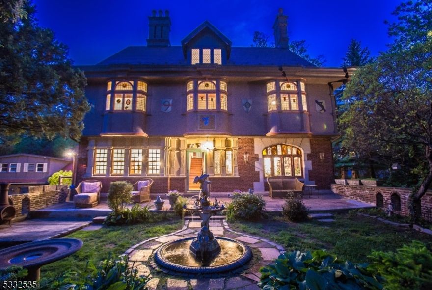 UNBELIEVABLE OPPORTUNITY to own not only a one of a kind home--but a piece of history!  Welcome to the Rabbit House--This absolutely stunning 1903 (the year of the Rabbit) Elizabethan Revival Style Home designed by renowned Architect, Joy Wheeler Dow as his primary residence.  Ideally located in the heart of the Upper Wyoming secton & moments from NYC train, downtown Millburn & part of award winning # 1 Wyoming School  & w/only 4 owners having the privilege to be the custodians of this magnificent piece of art! The character, craftsmanship, millwork & intricate details will astound.  Gorgeous in-layed HW flooring, Tiffany stained glass windows, original custom moldings, nooks & built ins will astound-including an updated Chef's kitchen w/prof. grade appliances; this sophisticated upgrade delightfully unite the vintage mystique w/modern convenience.  Travel back in time upon approaching this majestic estate & be wowed by every ornate detail including iron cast radiators attached to modern Priority heating system.  Every inch of this manor will captivate including the stone gateways & stately fountain in entry terrace that opens to private & expansive grounds w/a palatial detached 7 car multi level garage w/almost 1000 sq ft loft space--presenting w/such detail as an illuminated cupola & circular stained glass window towering over the garage.  Adorn w/historic significance & mystic, this story book estate is prime for expansion or continued love w/endless possibilities.