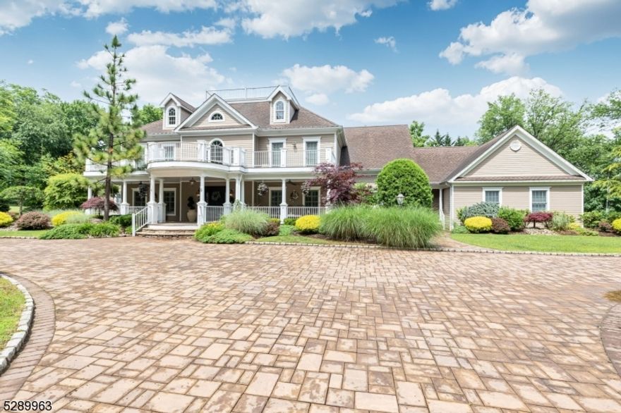 This Custom Home was built by the owner for the owner with every possible desirable feature and amenity!  Fabulous 15+ rooms above ground (20 total rooms) if you count the gorgeous Bsmt with Billiards Rm/Rec Rm, Bar/Game Rm, Home Theater, Climate Controlled Wine Rm w/1700 bottle storage and seating, Exercise Rm, Full Bath and Steam Rm. 5 of the 6 BRS have Walk-in Closets & Exit doors to 1st & 2nd floor decks, Stereo Pad for music & a Private Bath. 2 master suites, one on the first Flr with a Fireplace & one on the 2nd floor.  2 of the en-suites also have sitting rooms....these 2 suites may be possible in-law suites.  1st & 2nd Flr Laundry! 1 Yr old Gas fired boiler w/Radiant & Hot Water BB heat with 12  zones.  4 Central Air Conditioning Zones too.  There are 9' high ceilings on all 4 floors and oversized 3 car attached garage with stairs to the basement. This beautiful home sits on a quiet horseshoe street on nearly an acre of lush landscaped property!  Whole House Generator! There is over 6000 sq ft on the 1st & 2nd floors alone & another 3000 + sq ft in the Fin'd Bsmt.  Everything you could possibly want outside as well....a private, fenced rear yard w/pro-landscape & Gunite Pool, Paver Patio, Outdoor Kitchen with Granite Tops, Pergola, Wood-fired Pizza Oven and a Wood burning fireplace.  Way too many amenities and upgrades to list here!  A "MUST SEE" one of a kind custom home in excellent condition!