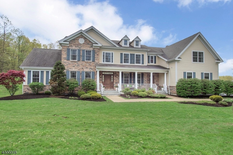 Exceptional in every way - Open floor plan with multiple entertaining spaces. Premier lot in highly desirable No Caldwell school district. Two-story Great Room with floor-to-ceiling stone fireplace. Spacious living room, dining room with cove ceilings, exquisite deep moldings, excellent craftsmanship. French doors to office. Enjoy spacious sunroom surrounded by three walls of windows. Master suite with walk-in closet, master bath with two separate vanities, & separate sitting area. Second floor den, plus three additional bedrooms and two baths. Lower level: rec room, game room, & exercise space. Finished room with bath. Mud room/laundry on first floor. Fabulous pool & patio for summer entertaining. Private property backs up to Hilltop Reservation with biking, hiking and walking trails. Excellent value!