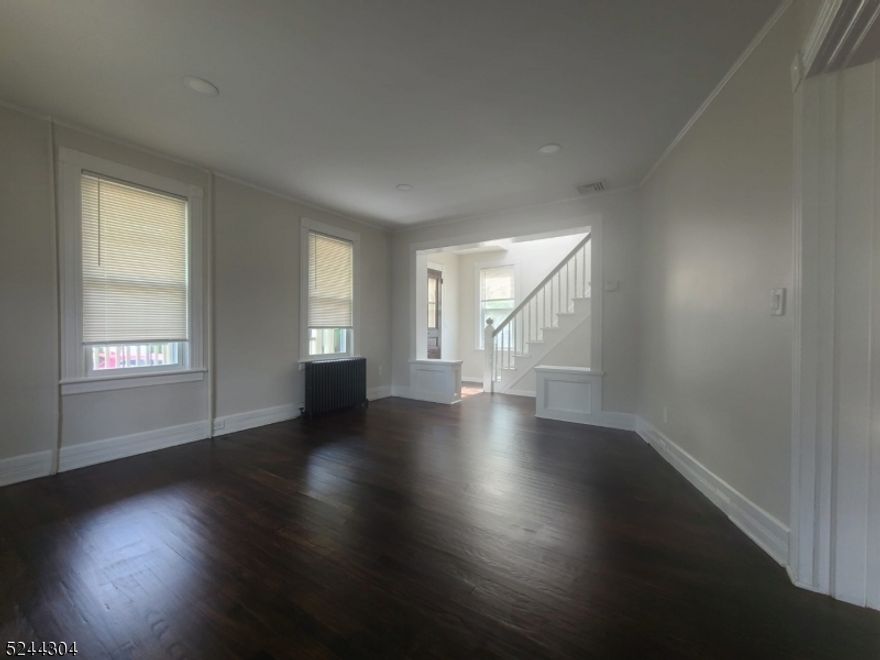 Completely renovated 3 bedroom 2 bathroom house in a quiet street. Yard, deck, 3 car driveway. Garage/storage. Basement with brand new washer and dryer. Open-concept kitchen with brand-new appliances. The primary bedroom has a walk-in closet. Double closets are available throughout the house. Central Air! Located 2 min to/from Newton Hospital and 5 minutes to supermarkets and shopping. Rent includes water and sewer. This is a fantastic rental!