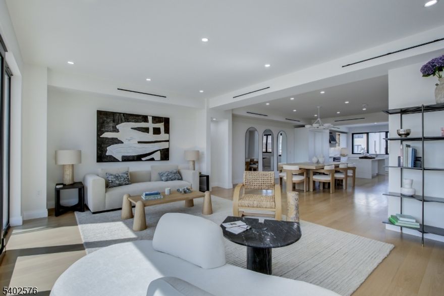 New Construction! Experience Unparalleled Luxury Living at The Seashore in Long Branch! Ride your private in-unit elevator up 4 levels to your expansive rooftop terrace & savor sweeping ocean views. Just minutes from the beach & Pier Village, this limited collection of 14 luxury townhomes offers close to 3,200 sqft of designer interior living space (+1108 SF outdoors) with 3 bedrooms + den, 3.5 baths, multiple balconies & a heated, EV charger ready garage. A modern masterpiece, each home features custom European windows and doors, open-concept living, and a chef's kitchen with premium smart appliances: Nostalgie by ILVE stove & SAVALO refrigerator and dishwasher.After a day at the beach, relax in the exclusive heated resort-style pool or explore the vibrant dining, shopping, and nightlife of Pier Village, Red Bank, Asbury Park, and Sea Bright, with NYC just a ferry ride away. Located minutes from the future home of Netflix, this is coastal luxury at its finest!