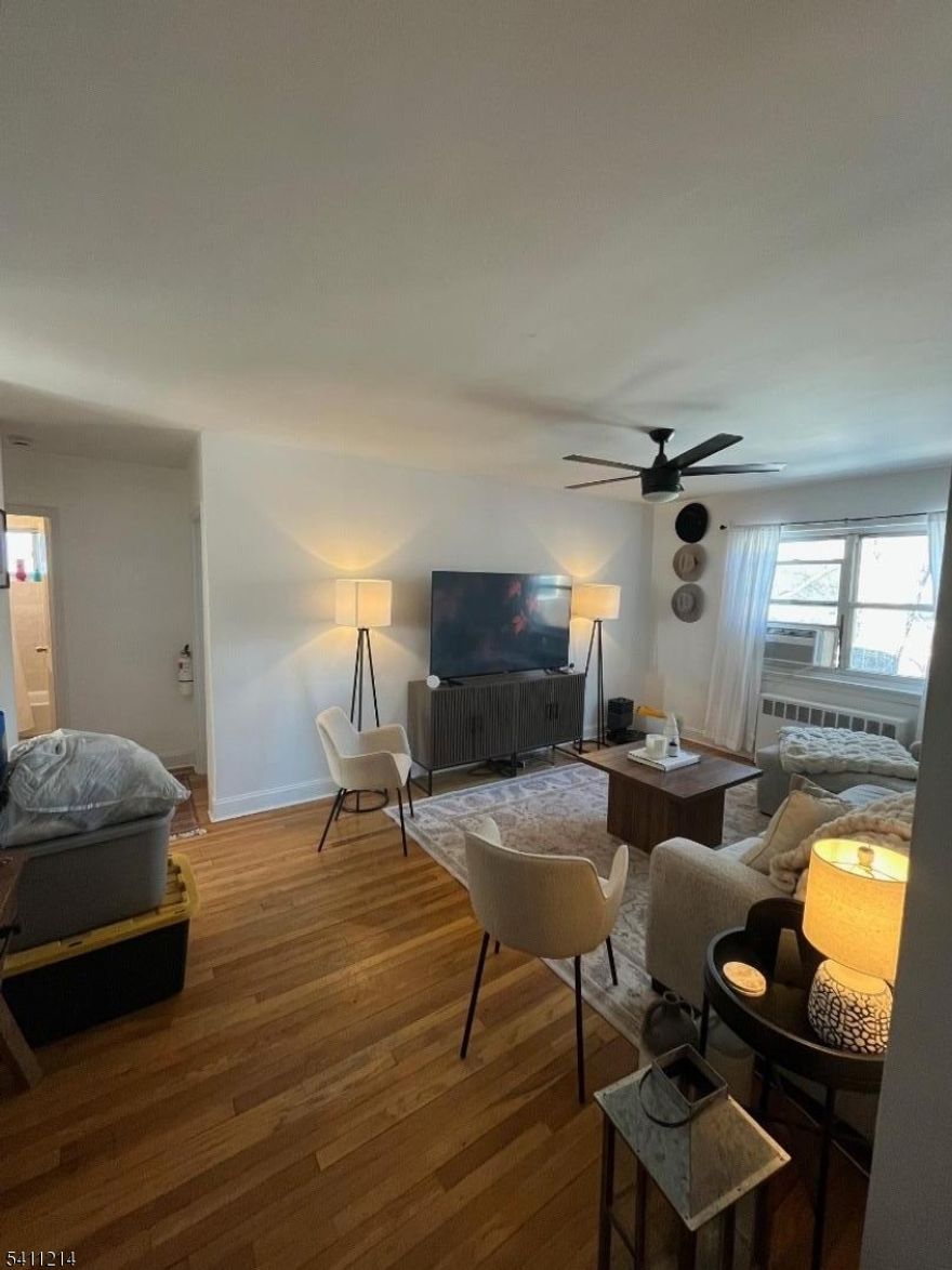 TOP floor unit available! Incredible location, extremely convenient to NYC. Heat and hot water are both included. Unit comes with a parking spot, adding even more convenience. Buses direct to NYC right outside of the complex. Laundry facilities are also on site within the community. 1 bedroom unit with a small den, perfect for a home office or a child's room. This will not last, schedule a tour today!