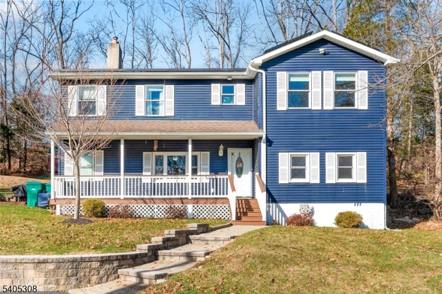There's something about this home that feels easy. It offers a lifestyle centered around simplicity, space, and everyday comfort. Mornings start on the covered front porch with a coffee in hand, while evenings wind down on the deck or by the warmth of the fireplace inside. The main living area is open, bright, and welcoming, with natural light and updated flooring throughout. The kitchen blends style and function with stainless steel appliances, a center island, and direct access to outdoor space, making it perfect for both quiet nights in and casual gatherings. Upstairs, you'll find four or more bedrooms, including a spacious primary suite with a walk-in closet, offering a private retreat at the end of the day. Flexible rooms on the first floor provide options for a home office, creative space, or additional living areas to fit your needs. Outside, the property opens up to a wide, level yard with room to relax, play, or enjoy the surrounding natural setting. A newer shed, paver walkway, and thoughtful updates throughout add to the ease of living here. This home offers a balanced lifestyle where comfort, space, and a quieter pace come together.