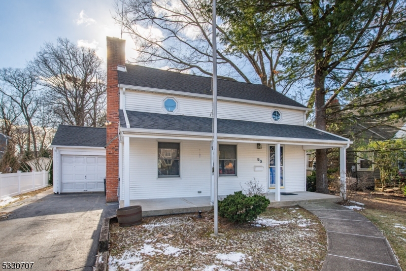 Opportunity knocks in Desirable Pompton Plains on Beautiful Hopper Ave! The Inviting Front Porch will Welcome you Home! This 3 Bedroom 1 and a Half Bathroom Colonial has an open floor plan. The Living Room boasts a wood burning fireplace with liner, open to the Dining Room , Den, and  Kitchen with a double wall oven and gas cooktop.  A Laundry Room and Half Bathroom complete the first floor. Upstairs you will find a generous size Full Bathroom, Primary Bedroom with a Double Closet , a Walk In Closet, Sliders to a 2nd Story Deck overlooking the beautiful back yard, and two more Bedrooms. The basement is finished ...has a tile floor , utility room and storage. The yard is fenced, level and has a patio area, gas hook up for grill ,a storage shed and underground sprinklers! Do not miss this one! NO FLOOD