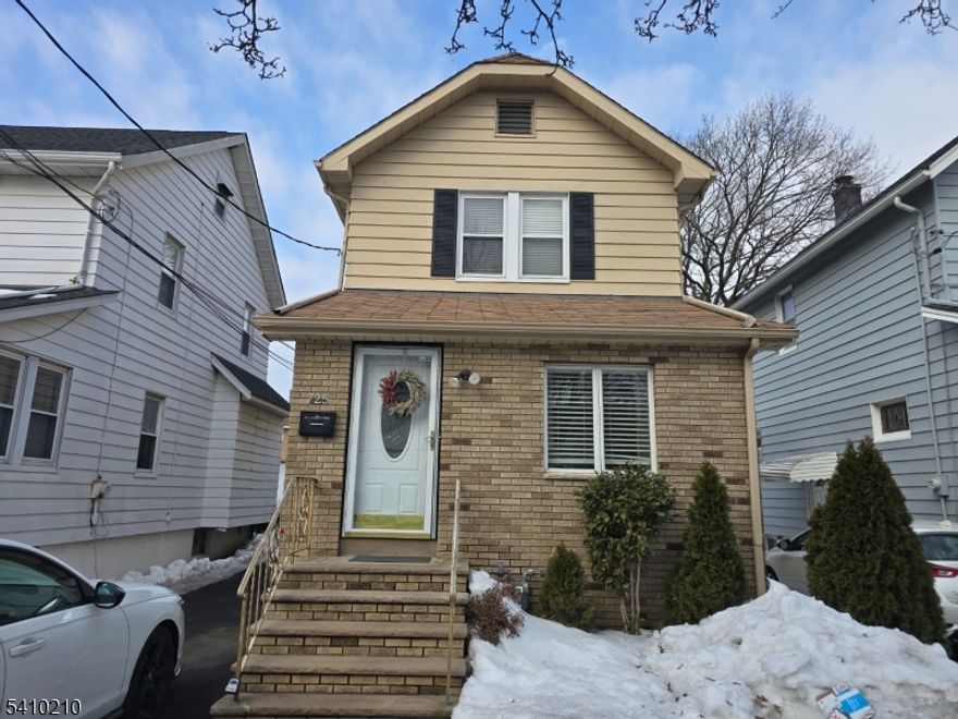 Within in close proximity to parks, shopping centers, transportation stations to NY bus and trains.This home features an open living space and modern kitchen on the first floor.  The second floor had 2 bedrooms an updated bathroom. A partially finished basement, with laundry room and full bathroom.  There is a detached garage with storage space and a long driveway that can fit an additional 4 cars.