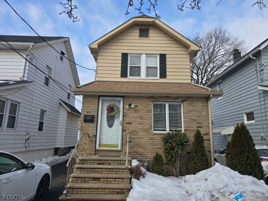 Within in close proximity to parks, shopping centers, transportation stations to NY bus and trains.This home features an open living space and modern kitchen on the first floor.  The second floor had 2 bedrooms an updated bathroom. A partially finished basement, with laundry room and full bathroom.  There is a detached garage with storage space and a long driveway that can fit an additional 4 cars.