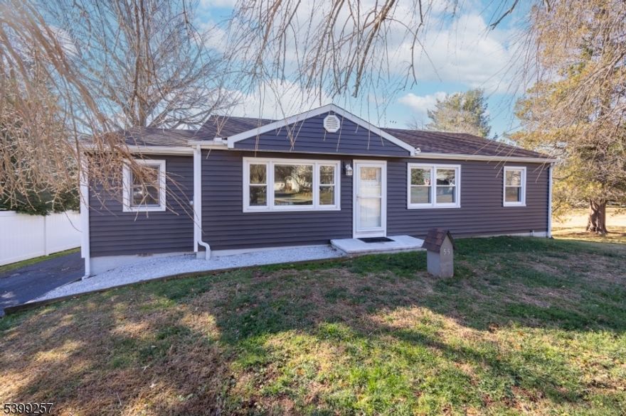 Multiple offers received. Seller is asking for highest and best by Wednesday December 10th at 12 pm. Fabulous 3 bedroom ranch on 1.28 acres! Over 100K in updates and improvements! 2025 new kitchen, 2023 Deck, 2022 windows; siding; high efficiency water heater; central air; gas boiler and dishwasher, 2021 door to deck, 2020 basement double doors and 200 amp electrical panel, 2019 garage door and much more. Walkout basement with laundry, additional family room and storage that leads to an oversized garage. Convenient to highways and shopping.