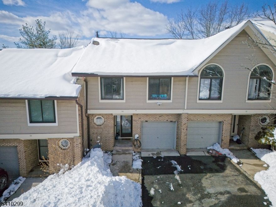 Welcome to this beautifully updated 3-bedroom, 2.5-bath townhome in the highly desirable Beacon Hill community of Verona. The renovated kitchen features newer stainless steel appliances, ample cabinetry, and a layout that flows seamlessly into the main living areas. The inviting living room showcases a newly renovated fireplace with stunning wood shiplap and custom mantle, creating a warm and stylish focal point. Upstairs, the large primary suite offers generous space with an updated full bath, while two additional bedrooms and another full bath provide flexibility for guests, work-from-home needs, or everyday living. The freshly painted, finished walkout basement with new carpeting adds valuable living space and is currently used as a home office and playroom, ideal for today's flexible lifestyles. Enjoy low-maintenance townhome living in a prime location close to Verona's shops, restaurants, parks, and major commuting routes. A true move-in-ready opportunity in one of Verona's most sought-after developments.