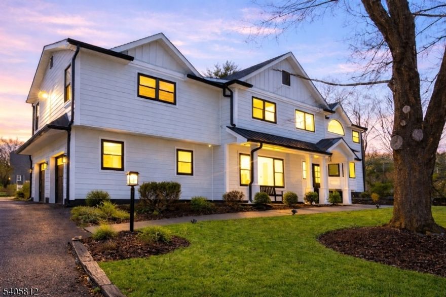 Welcome to this beautifully updated, move-in-ready home offering style, space, and comfort. The open-concept layout is filled with natural light and features a stunning kitchen with an oversized island, quartz countertops, custom cabinetry, and brand-new stainless steel appliances perfect for everyday living and entertaining. The spacious living area showcases hardwood floors, recessed lighting, and custom built-ins, creating a warm and inviting atmosphere. This home offers 4 generously sized bedrooms, including spacious walk-in closets, providing ample storage throughout and two full bathrooms and one half bath, The finished basement adds valuable living space, ideal for a family room, home office, or gym. The home features  thoughtfully designed for convenience and functionality. Exterior highlights include Hardie board siding, black-trimmed windows, and a charming covered front porch that adds to the home's exceptional curb appeal.