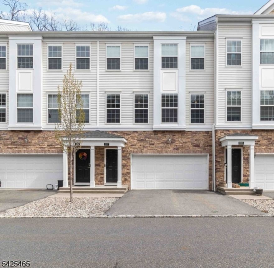 Ideally situated within The Hills complex, this recently built townhome offers three floors of easy living. The main floor boasts an open floor plan with spacious dining and living areas, updated flooring, high ceilings, recessed lighting, and lots of natural light. In the kitchen you will enjoy a large center island, stainless steel appliances, a pantry closet, and plenty of cabinet and counter space. With a powder room and a deck right off the kitchen, this level is ideal for both everyday living and entertaining. On the upper level you will find a primary suite with custom walk-in closet and en-suite bath. Two additional bedrooms with custom closets, a full hall bath, and laundry complete the upstairs level. The walk out ground level provides a finished and versatile space with another full bath, making it great for a den, home office, or guest quarters. Access the back patio through slider doors and enjoy an entrance from the two car garage on the lower level. Garage also offers additional storage space. Enjoy multi zone heating and cooling, custom window treatments, modern updates throughout, and low-maintenance living. The Hills by Lennar is a great community with sidewalks, privacy, ample parking, a playground, and low HOA fees. Conveniently located to major highways, shops, dining, and only 35 miles to NYC.