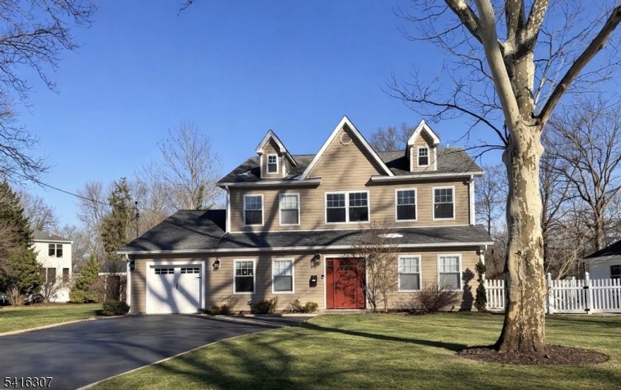 THE PERFECT HOME WITH A WHITE PICKET FENCE! Don't Miss This Exceptional Custom Colonial, NEWLY BUILT FROM THE FOUNDATION UP IN 2019. Showcasing Superior Craftsmanship, Quality, & Style. SITUATED ON A QUIET DEAD-END STREET, Will Impress Even The Most Discerning Buyer. The Thoughtfully Designed Open And Functional Layout Is Ideal For Everyday Living & Entertaining. The Gourmet Eat-In Kitchen Features Crisp White Cabinetry, Stainless Steel Appliances, Stylish Countertops, A Working Center Island w/Breakfast Bar, & Pantry Closet. The Kitchen Flows Seamlessly Into A Generous Family & Dining Rooms, Highlighted By A Dramatic Floor-To-Ceiling Stone Electric Fireplace. Slider To A PAVER PATIO WITH NEW 2025 AWNING & A PRIVATE, PARK-LIKE BACKYARD. Upon Entering, A DRAMATIC TWO-STORY FOYER WELCOMES YOU W/CUSTOM MILLWORK & Elegant Detailing. FIRST FLOOR GUEST BR SUITE Offers A Private Bath & Walk-In Closet Perfect For Visitors Or Extended Living. A Formal Living Room Is Complemented By A Butler's Pantry, Wet Bar & Wine Refrigerator. Completing The Main Level Is A Mudroom Providing Direct Access To Garage. Upstairs, The LUXURIOUS PRIMARY SUITE W/TRAY CEILING, RECESSED LIGHTING, TWO WALK-IN CLOSETS, SPA-INSPIRED BATH- Custom Glass-Enclosed Shower, Modern Tub, & Double Sink/Vanity. Two Additional Generously Sized Bedrooms w/Custom Closets Share A Full Bath In Hallway, & Convenient Laundry Room/Office. Lovely Yard. Located Close To Town, Great Schools, Houses Of Worship, And NYC Bus.