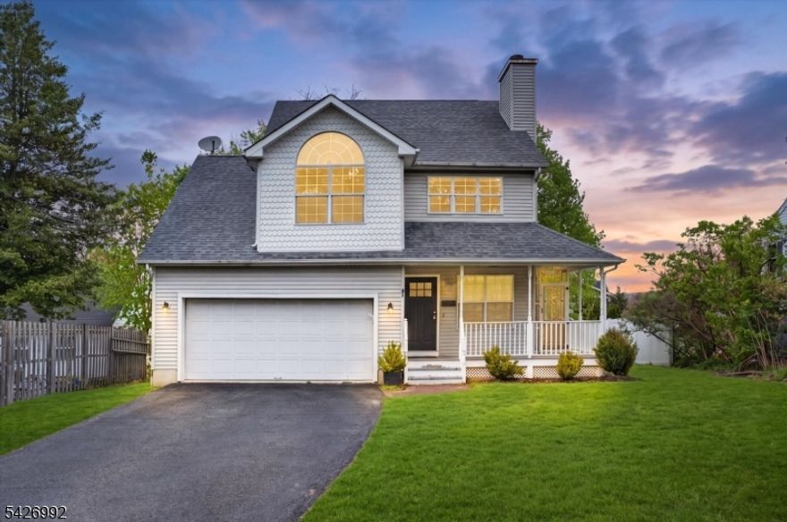 Charming 3-bedroom, 2.5-bath Colonial featuring a welcoming wraparound front porch and beautiful curb appeal. Step inside to a warm and inviting living room highlighted by a cozy wood-burning fireplace, perfect for relaxing evenings at home. The functional layout offers comfortable living spaces and a semi-finished basement, ideal for a recreation room, home office, or additional living area. Outdoors, enjoy your own private retreat with a fenced-in backyard complete with a spacious two-tiered deck, perfect for entertaining or unwinding. A 2-car garage plus a driveway with parking for up to 4 additional vehicles provides ample space for guests and everyday convenience.This home combines classic charm with great outdoor space, all in a convenient Newton location close to town, shopping, and major routes.Don't miss this wonderful opportunity!