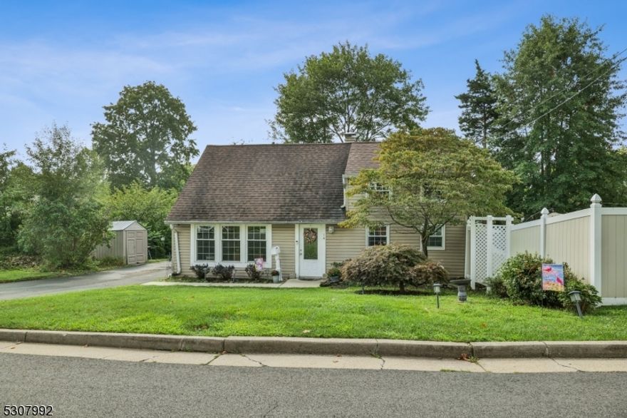 Colonia Comfort & Convenience! As you step inside, you are welcomed into the living room with beautiful hardwood floors that extend throughout the entire home. The gourmet kitchen is at the heart of the home, a chef's dream boasting granite countertops, tile backsplash & custom wood cabinets, complemented by top-of-the-line appliances and an expansive pantry to ensure ample storage for all your culinary needs. The expansive family room is perfect for holiday gatherings with a gas fireplace and glass doors leading to a private outdoor porch. The formal dining room leads to the stunning backyard deck and patio, where you'll find a charming screened-in gazebo lounge. The first floor also features a spacious primary bedroom, offering a private retreat with easy access to the rest of the home. Upstairs, you'll find three guest bedrooms, along with full bathrooms on both levels for added convenience. Outside, 2 separate private outdoor areas are perfect to enjoy the serene surroundings, or host guests with plenty of outdoor entertaining space, all enclosed by a privacy fence. Located just minutes from Metropark Train Station with a direct line to NYC and major cities, this home also offers easy access to the Garden State Parkway and Staten Island, making it a commuter's dream. With great proximity to local parks and schools, don't miss the chance to make this exceptional Colonia gem your home.