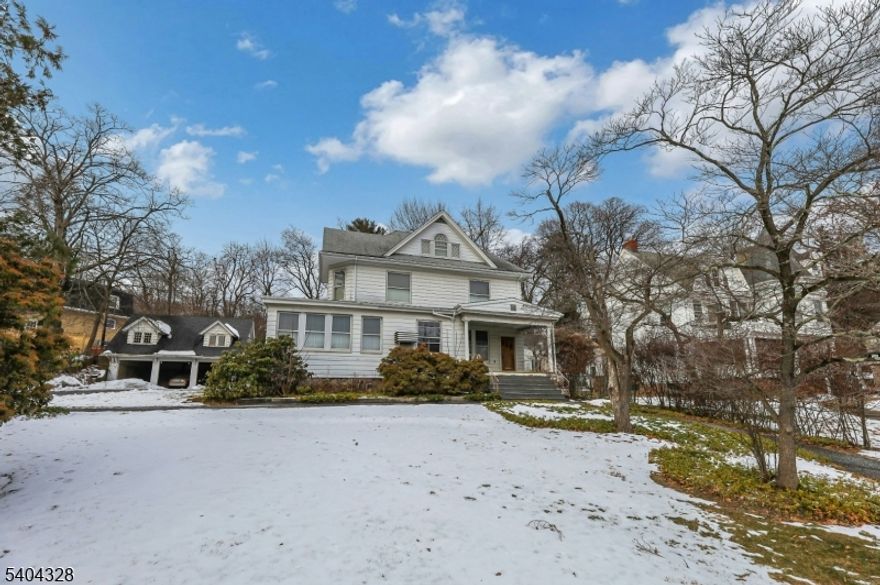 Historic 1895 Colonial style home with Endless Potential. Opportunity awaits with 3 floors of sprawling living space plus a basement, offering timeless architecture and the chance to restore a true classic to its former grandeur. With 7 bedrooms and 4 full and 1 half bathrooms, this expansive residence is ideal for investors, renovators, or visionaries seeking a statement property with historic charm.  The home showcases many original elements ready to be revived, including generous room sizes, high ceilings, beautiful hardwood floors, period details, and traditional Colonial proportions. While the property is being sold as is and in need of renovation and updating, the scale and layout provide a strong foundation for a remarkable transformation. Adding to the value is a detached garage and living space above, also requiring improvements but offering incredible flexibility perfect for a multitude of possibilities. Set on a lot that complements its historic roots, this property presents a rare chance to reimagine a grand 19th-century home and create something truly special.