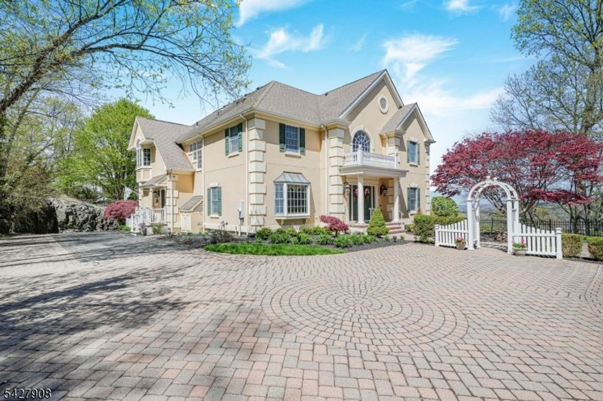 Over 5000 sq ft w/ breathtaking views & total privacy inside a gorgeous gated swim/tennis community! This elegantly appointed 5 Bedroom, 3.5 bath Custom Colonial is the perfect blend of luxury & comfort! From the grand 2 story foyer to the stunning mountain & sunset views, no detail was overlooked! Spacious eat in kitchen w/ center island, walk in pantry, breakfast bar, & breakfast room w/ wall of windows! Grand family Room space w/ 2 story stone fireplace, soaring coffered ceiling, built in cabs, & gorgeous oversize window. The formal dining room is a great space for entertaining w/ a tray ceiling, window seat, & adjacent butler's pantry w/ wet bar. 1st floor office has French doors, custom millwork, & built ins. A formal living room, sunroom, & powder room are also located on this level. Upstairs the Primary Suite offers a sitting room w/ gas fireplace, balcony overlooking the mountains, 2 walk in closets, & fabulous en suite bath w/ jetted tub, stall shower, bidet, & dual vanity. 4 additional BRs plus 2 baths completed this level. The finished walk up attic offers more storage & access to a ONE OF A KIND rooftop deck overlooking the mountains & surrounding farmland w/ spectacular evening sunsets! Additional features include: 1st floor laundry/mud room, fin basement rec room, 2 garage doors w/ space to park 3-4 cars using the tandem space, Enjoy Panther Valley's 3 outdoor pools, tennis/sport courts, playgrounds, scenic walking paths, & optional golf access.
