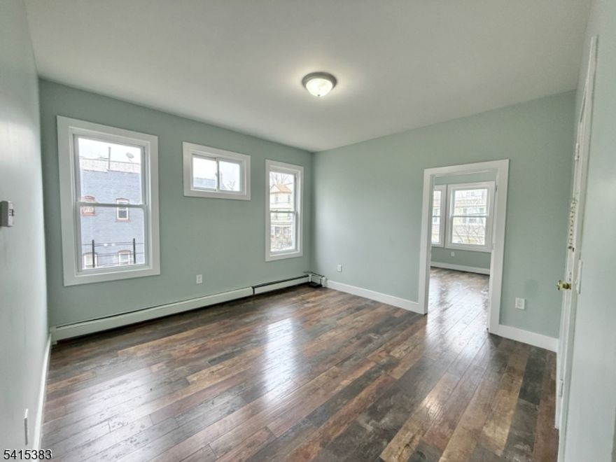 Freshly painted and move-in ready, this spacious apartment features 3 bedrooms and 1 full bathroom, offering a comfortable and functional layout. The unit provides plenty of natural light and a welcoming living space, perfect for everyday living. Conveniently located close to shops, public transportation, and major highways, making commuting and daily errands easy. Don't miss the opportunity to enjoy comfort and convenience in a great location.