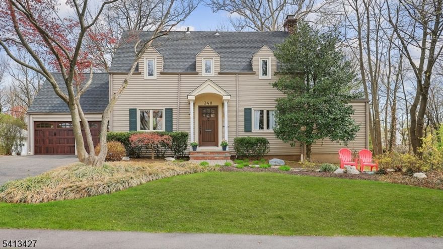 Charming Colonial/ Cape offering 3 bedrooms and 2.5 baths, blending classic character with thoughtful updates. The inviting entrance vestibule leads to a spacious living room with a gas fireplace, hardwood floors, and elegant archways. A formal dining room is perfect for entertaining open to updated kitchen featuring quartz countertops and new SS appliances. First floor en suite bedroom provide flexible living options. Upstairs, the primary bedroom includes 3 closets, newly renovated full bath and 2nd bedroom with 2 closets. Additional highlights include CAC, 2 car detached garage. Ideally located near Fanwood's vibrant downtown, parks and Library.