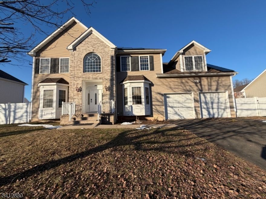 Welcome home to your next luxury rental. FIRST FLOOR BED & attached FULL bathroom. 5 bedrooms 3.5 bath center hall colonial with a large fenced-in yard and a 2 car garage. Enter through your dramatic 2 story foyer with the formal living room on the left and formal dining on the right. Kitchen features granite countertops & stainless steel appliances along with an island overlooking the large family room. Half bath on first floor. Also on this level is a first floor bedroom with an attached full bathroom. Second floor features 4 additional bedrooms including a large primary with a WIC & ensuite. Full unfinished basement perfect for storage. 9 foot ceilings on first floor. Solar panels will keep your utility bills low. Tenants responsible for all utilities. Pets are negotiable on a case by case basis. Flexible lease term.