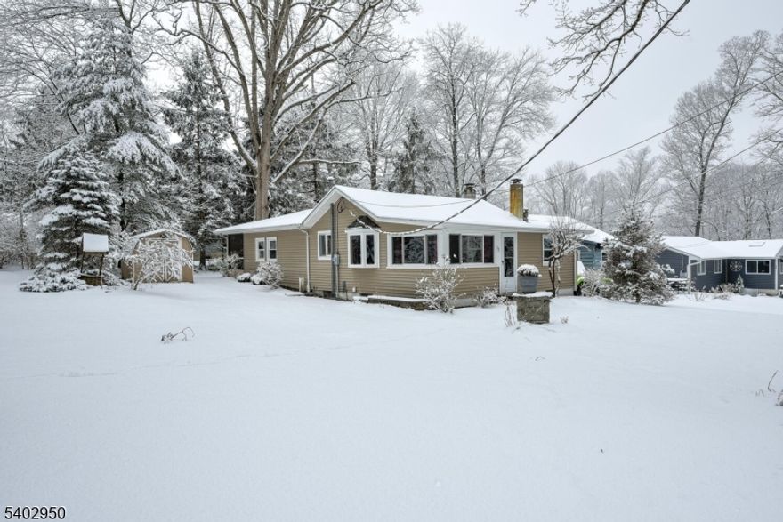 Year round ranch with own well and septic. Well maintained move in ready. Double lot goes all the way to the corner of Wallkill Dr and Pochuck. Beautiful patio and screened in porch in the rear of the house.