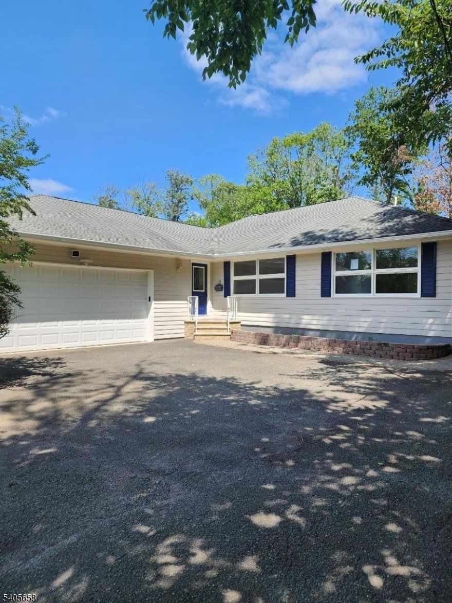 Welcome to this inviting 3-bedroom, 3-bathroom home with additional den, located on a quiet residential street. The spacious living room features a convenient laundry closet, while the large three-season sitting room provides the perfect space to relax and unwind. The eat-in kitchen includes an island offering additional seating, ideal for casual dining and entertaining. All three bathrooms have been tastefully renovated with today's modern designs, complete with LED mirrors. In addition to a full basement, the home offers an oversized two-car garage with ample storage space. Step outside to a large deck and generous backyard perfect for entertaining and outdoor gatherings. Don't miss this wonderful opportunity!