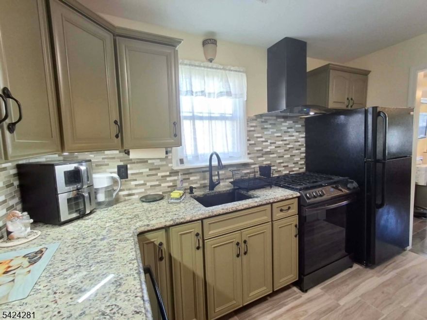 Beautifully renovated home in great location, close to the Sand of Ideal Beach NJ, amazing  views on NYC panorama, Living & Dining Room        Chef's KitchenFull newer Bath with tub,    Bonus Room Ideal for possible office    Huge, private backyard,central air and heat,gas cooking, freshly painted,Roof 2017, fenced in yard, 2 storage units large deck, side driveway for 2 cars,quiet street, never flooded, near by playgrounds, water fun parks, NYC bus,ferry and train, do nothing, move in , Enjoy...