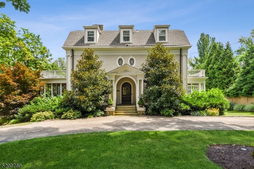 Nestled in the premier Northside neighborhood, this 7 bedroom classic Summit home is elegantly finished across four floors. Hardwood floors, arched windows, detailed carpentry, solid wood doors, coffered ceiling, natural light throughout. Enter the arched wood front door, a spacious foyer welcomes you home. Formal living room features a fireplace saddled by built in cabinetry/bench and french doors leading to a charming sunroom. The generous formal dining prime for entertaining is enhanced with a fireplace and bay window. The screened porch with its hand painted floor is easily accessible through either the dining or family room. The well designed family room is conveniently located off the kitchen. High end gourmet kitchen features custom cabinetry, pantry, eat in area, center island with breakfast bar, wet bar, Sub Zero refrigerator, Wolf stove. The second floor, with access from two staircases, includes the primary suite with fireplace and en suite full bath connecting to a primary study or standalone bedroom. 2 more second floor bedrooms are served by a hall bath. The finished third floor has 3 bedrooms and full bath, along with a bonus office/playroom. The finished lower level provides additional recreation space. Oversized mudroom with custom built-in storage makes busy mornings a breeze. Storage, laundry, and utilities complete the lower level. The corner lot allows for two parking options: a front circular gravel driveway and side two car garage with extended driveway