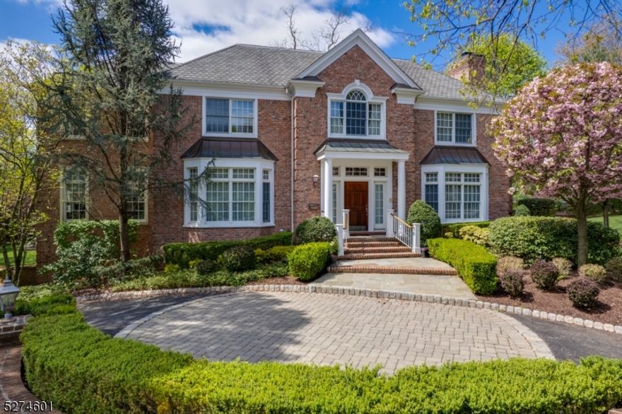MOVE RIGHT IN!  Magnificent 5/6 Bedroom, 7.1 Bath home on 1 acre (!) in Old Short Hills with top-notch schools (Hartshorn Elementary), close to parks and recreation, Short Hills Mall, Routes 24/78 and Short Hills train station. Expert craftsmanship, high ceilings, and an open and airy floor plan.  Chef's Kitchen with warm wood cabinetry, island, high-end Sub-Zero/Viking/Miele appliances and granite countertops. Dramatic Entry Foyer with gorgeous staircase. Elegant Library/Office with built-ins. Regal Dining Room with beautiful moldings and coffered ceiling.  Dreamy Living Room with fireplace. Out of this world Family Room with fireplace and incredible views of the picturesque backyard.   Magical Sun Room.  Butler's Pantry with icemaker.  1st level Guest Room with Full Bath.  ENORMOUS Primary Bedroom Suite with Sitting Room, luxurious fully custom Walk-In-Closet, bedroom with fireplace and spa-like Bath.  4 other ensuite bedrooms on Second Level with fabulous custom closets (3 walk in) and tasteful baths. 2nd Floor Laundry Room. Unfinished Third Level. Lower Level with spacious Recreation, huge landing/potential Mud Room area off garage, 3 Car Garage with so much storage and Full Bath.  Magical property with NEW Timbertech Deck, large Bluestone Patio with outdoor fireplace, plenty of green space and plantings. The kind of home where all you need to do is drop your bags!