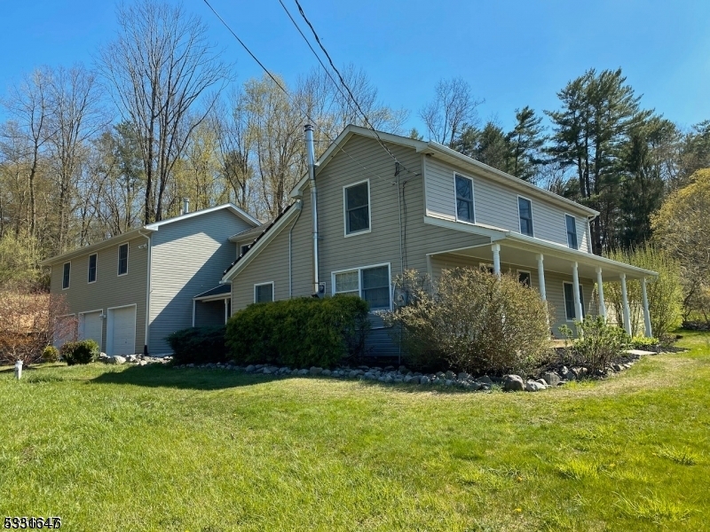 This 3-bedroom, 2-bath home features a spacious studio, office, or workshop situated above an attached three-car garage and living room?perfect for a home business. With over 3,000 square feet of living space, it offers breathtaking views of a thoroughbred horse farm and the scenic Appalachian mountains. Blending colonial charm with modern convenience, the home includes newer wood flooring, quartz counter-tops, and updated kitchen appliances. Stay comfortable year-round with dual central A/C and heating, while solar panels and a Tesla charger provide energy efficiency. The backyard boasts newer privacy fencing surrounding a charming patio, making this property an ideal blend of beauty, comfort, and practicality for both living and working.