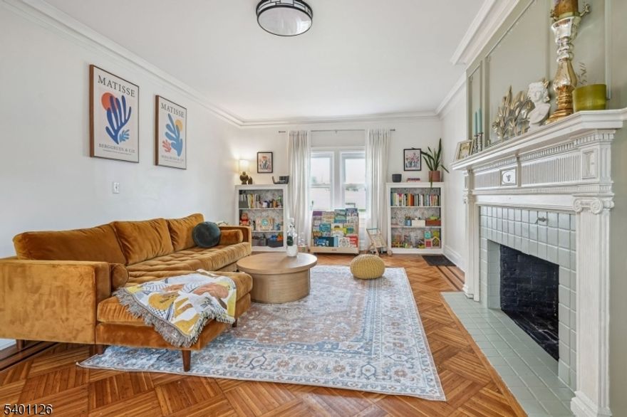 Welcome to Westminster Avenue, a stately residence on one of the neighborhood's most desirable oversized lots. This exceptional home blends architectural character, scale, and rare future potential in one of Elizabeth's most sought-after locations. Rich period details include hardwood floors with intricate inlays, curated stained-glass windows, and an elegant original fireplace mantel. Expansive, sun-filled living areas, inviting kitchens with crisp cabinetry and modern finishes, and generously sized bedrooms span three levels. The top floor features uniquely styled rooms with skylights and charming rooflines. A full-sized finished basement adds functional space with full-size laundry, storage, and flexible options for recreation, fitness, or work. The large lot offers outdoor space rarely found in Elizabeth, with a wide lawn and adaptable layout ideal for entertaining or potential future development. Combining craftsmanship, character, abundant interior space, and unmatched lot size, this Westminster Avenue home is a rare opportunity near parks, schools, transportation, and neighborhood conveniences.