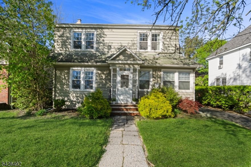Beautifully maintained Colonial home offering 4 bedrooms and 2 full bathrooms, ideally located in a highly desirable area close to downtown Maywood, top-rated schools, major highways, and convenient NYC transportation.  A sun-drenched foyer welcomes you into an expansive living room highlighted by walls of windows, along with a formal dining room with rich hardwood flooring, and a modern eat-in kitchen. The first floor also includes a versatile bedroom or private office, along with a full bath for added convenience and flexibility.  Upstairs, you'll find three generously sized bedrooms (4th bedroom currently being used as a walk-in closet), and a full bath complete with a timeless clawfoot soaking tub. A charming sunroom provides the perfect spot for morning coffee or enjoying quiet moments. The fully finished basement offers additional living space with a dedicated laundry area and abundant amount of storage.  Step outside to enjoy a backyard ideal for entertaining and summer gatherings, complemented by an oversized two-car detached garage complete with its own electric subpanel.  A rare opportunity to own a home that perfectly blends classic character, modern comfort, and an exceptional location. This is where your next chapter begins " Welcome Home"